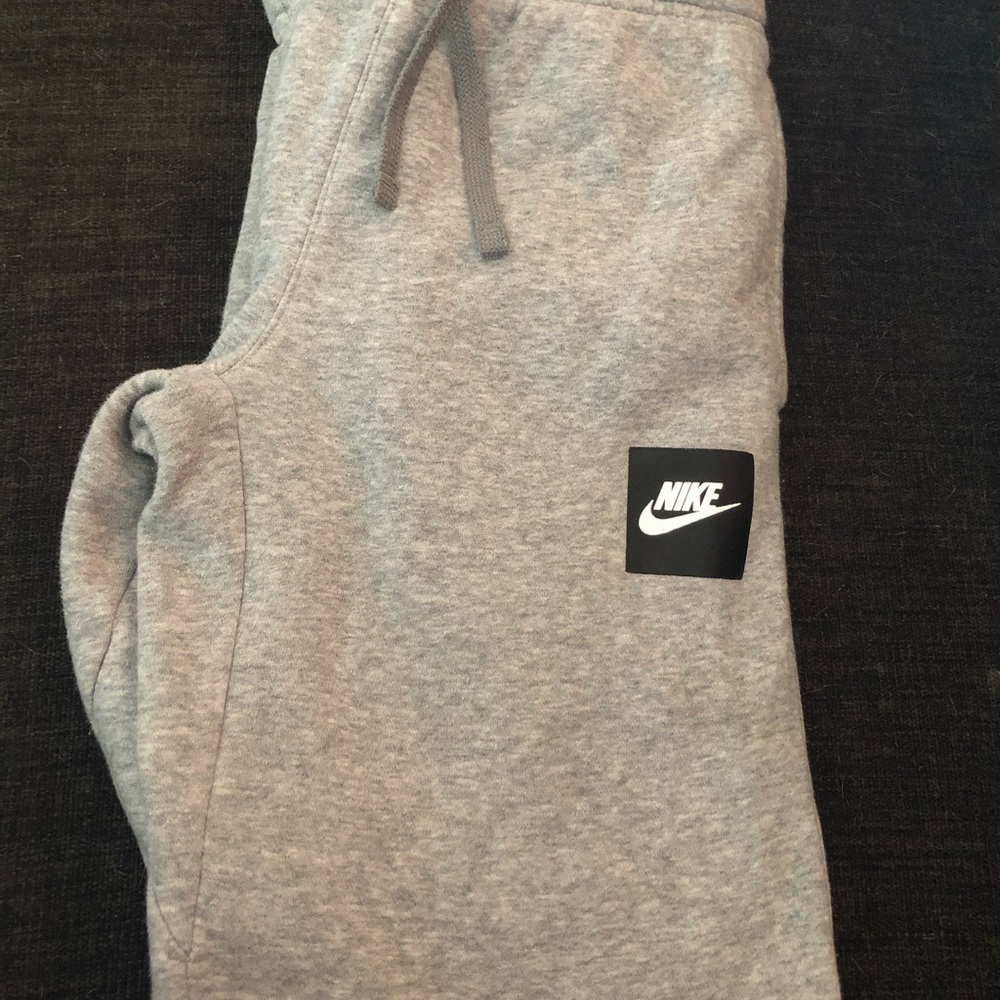 Grey Nike sweatpants